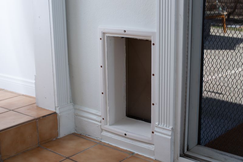 Professional Installing a Dog Door